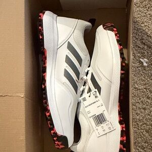 adidas White Golf Shoes with Black Stripes and Pink Outsole Accents